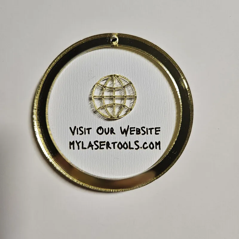 Website keychain made from gold mirror acrylic and paint plywood.